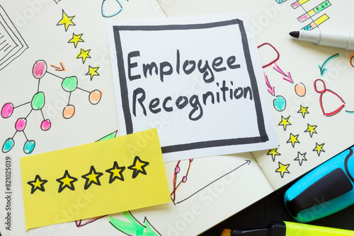 Business notepad and stickers with five stars and inscription employee recognition.