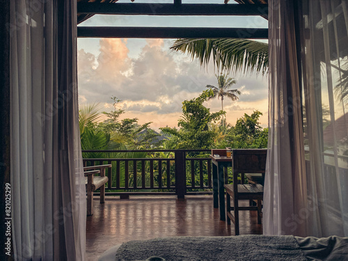 View from the villa balcony to a tropical sunset