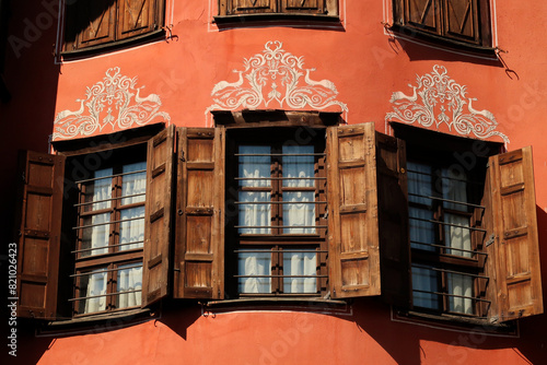 Three windows on the facade of the Georgiadi House, an example of National Revival Architecture in the old town of Plovdiv, Plowdiw, Bulgaria