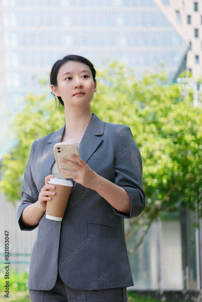 Young Businesswoman Using Smartphone Outdoors Young Businesswoman Using Smartphone Outdoors