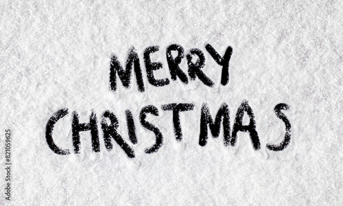 Merry Christmas written on snow