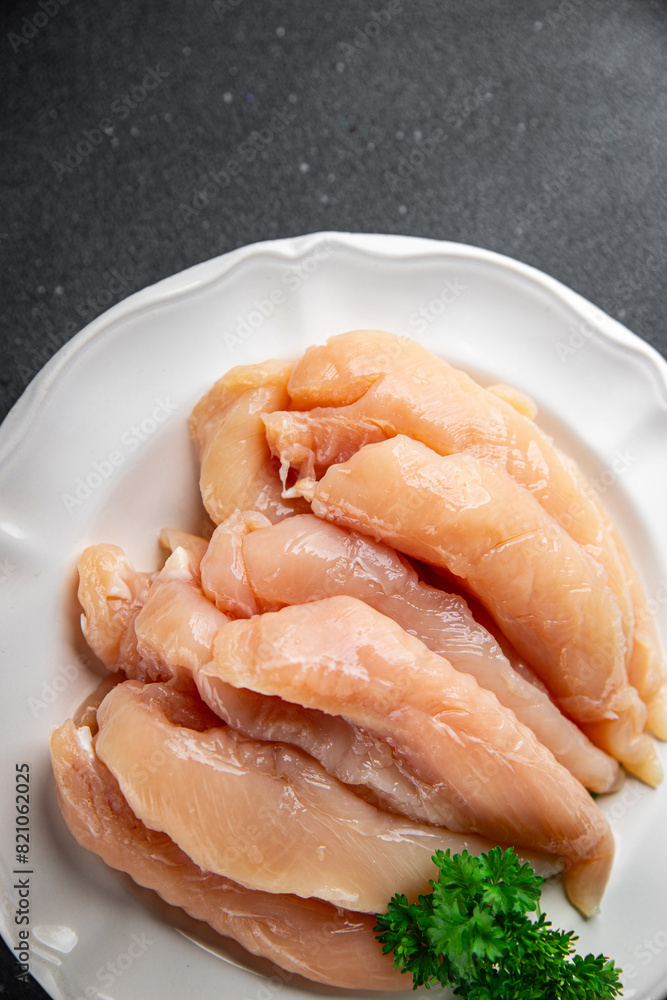 chicken meat raw aiguillettes fresh cooking meal food snack on the table copy space food background rustic