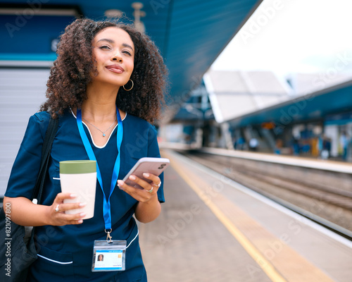 Fotografija Female Doctor Or Nurse Commuting On Train Platform With Mobile Phone And Reusabl