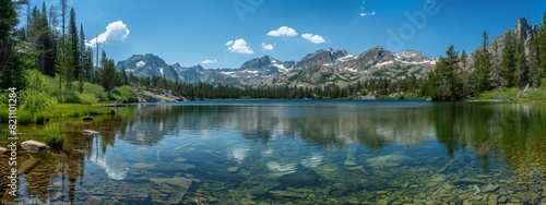A serene, mountain lake background with clear water and reflection of peaks.
