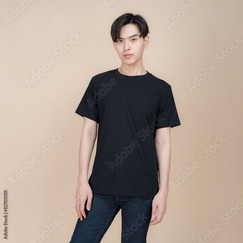 Young man posing in casual black t-shirt