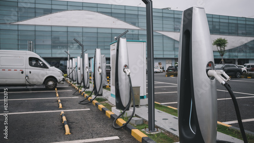 Modern Electric Vehicle Charging Stations at Urban Parking Lot photo