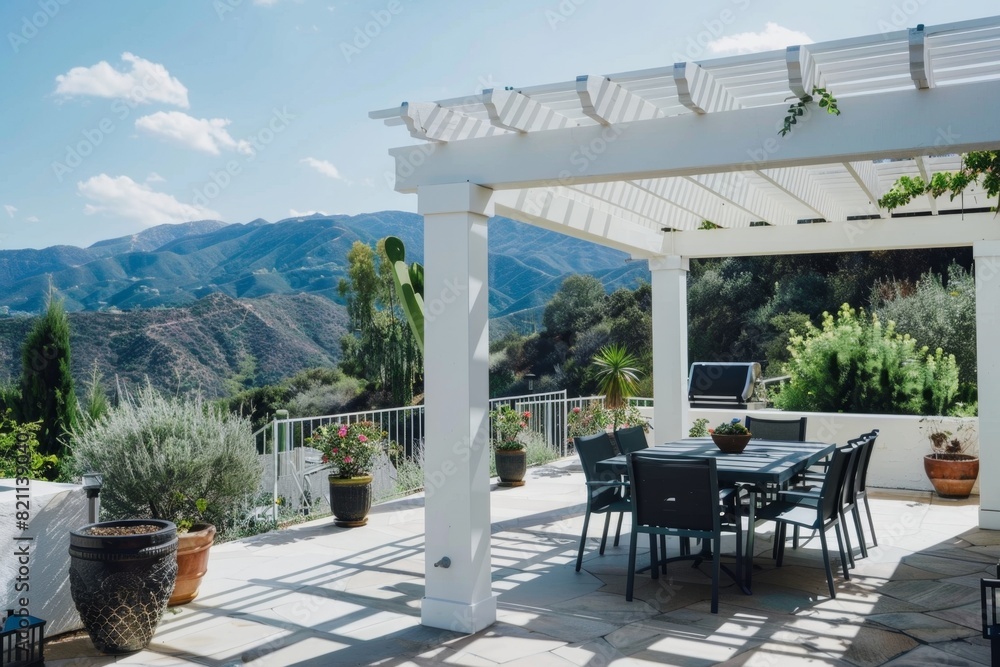 Fototapeta premium Minimalist Patio with Pergola, Black Dining Set, and Mountain Background