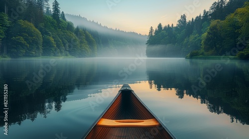  A serene lake surrounded by lush forests reflecting the sky, a canoe floating gently in the middle, mist rising at dawn. 