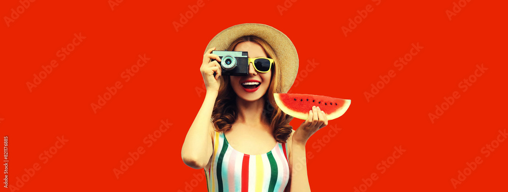 Summer portrait happy smiling young woman with film camera and slice of fresh watermelon wearing hat Summer portrait happy smiling young woman with film camera and slice of fresh watermelon wearing hat