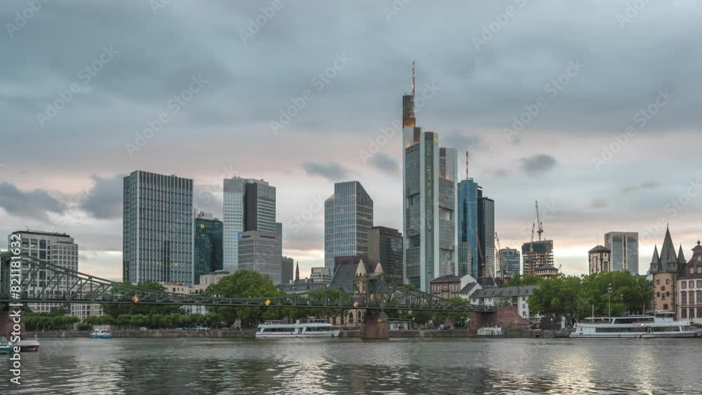 Frankfurt Germany time lapse, day to night sunset city skyline at Main River and business skyscraper Frankfurt Germany time lapse, day to night sunset city skyline at Main River and business skyscraper