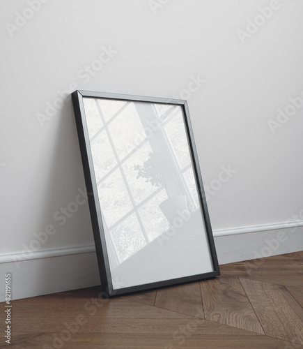 Black wooden frame poster mockup standing on the floor, 3d render photo