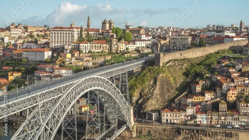 Porto Portugal time lapse, city skyline at Ribeira with Douro River and Dom Luis I Bridge photo