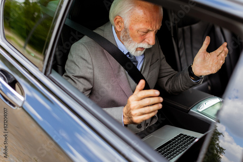 Senior businessman working ...