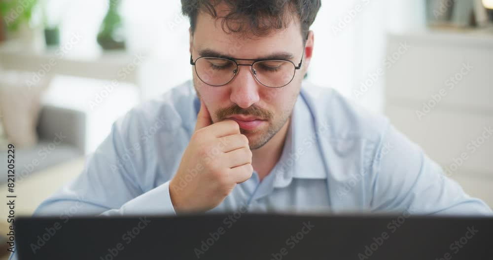 Close-Up of Man Reading Research on Laptop Close-Up of Man Reading Research on Laptop
