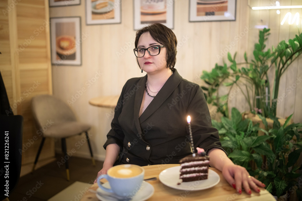 Portrait of a young beautiful dark-haired girl on her birthday. Portrait of a young beautiful dark-haired girl on her birthday.