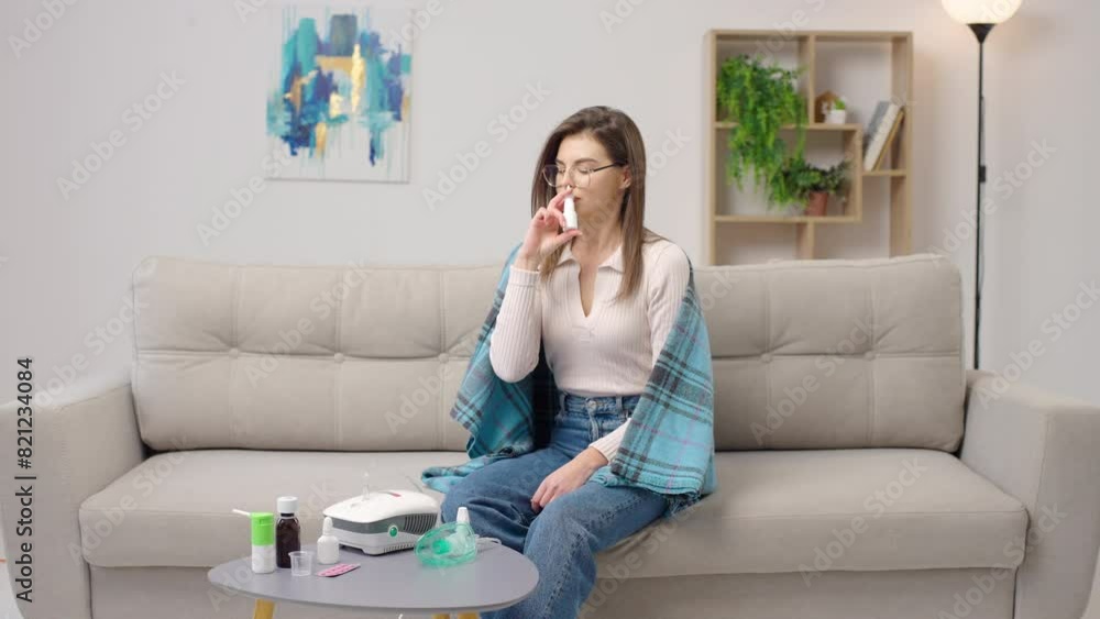 Portrait ill woman using nose spray for treatment respiratory disease Portrait ill woman using nose spray for treatment respiratory disease