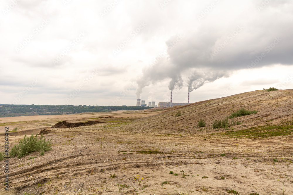 Coal-fired power plant and open-pit mine in Bełchatów, Poland. Coal-fired power plant and open-pit mine in Bełchatów, Poland.