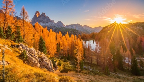 majestic sunset of the mountains landscape wonderful nature landscape during sunset beautiful colored trees over the federa lake glowing in sunlight wonderful picturesque scene color in nature photo
