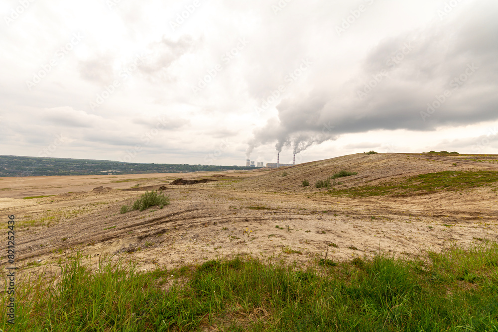 Coal-fired power plant and open-pit mine in Bełchatów, Poland. Coal-fired power plant and open-pit mine in Bełchatów, Poland.