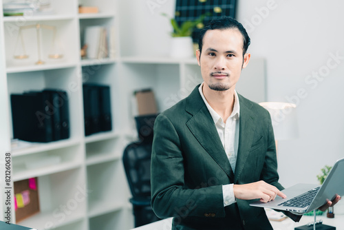 Asian businessman present s...
