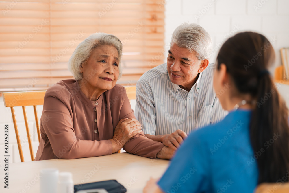Happy Senior Asian Woman Receives Medical Care at Home, Doctor or Caregiver Nurse Provide Support Assistance, Enhancing Healthcare Services for Elderly Patients Retirement Happy Senior Asian Woman Receives Medical Care at Home, Doctor or Caregiver Nurse Provide Support Assistance, Enhancing Healthcare Services for Elderly Patients Retirement