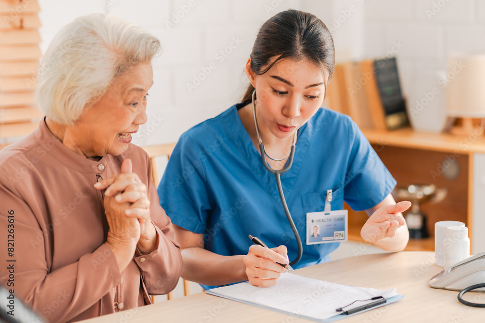 nursing home assistance in health insurance business concept, asian woman doctor or nurse caregiver support health care to elderly senior patient person, caretaker in medicals care recovery service nursing home assistance in health insurance business concept, asian woman doctor or nurse caregiver support health care to elderly senior patient person, caretaker in medicals care recovery service