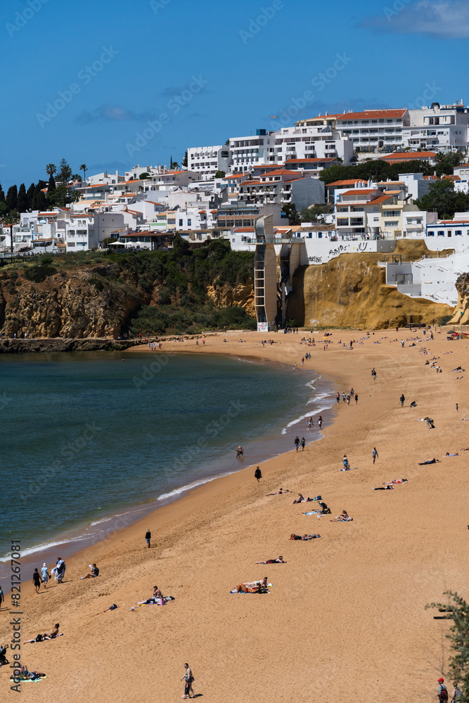 Praia do Peneco beach, Albufeira, Algarve, Portugal. Praia dos Pescadores beach. Fishermen, sunny day Praia do Peneco beach, Albufeira, Algarve, Portugal. Praia dos Pescadores beach. Fishermen, sunny day