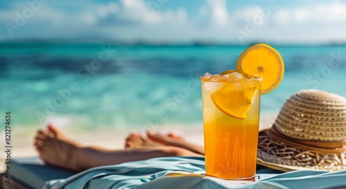 Person Relaxing on Beach With Drink