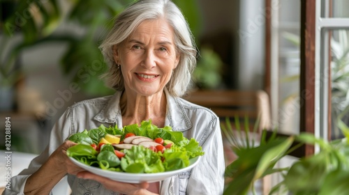 Elderly Woman Holding Plate of Salad