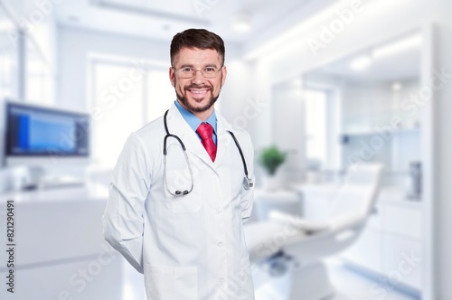 Professional young doctor posing in a dental clinic.