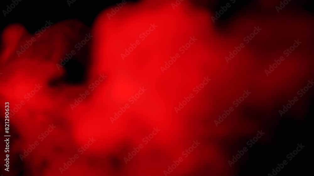 Explosion of Red Smoke or Powder on Black Blurred Background. Abstract, side view. Red soft puffs of smoke or steam mix chaotically on empty space. Particle explosion, bright light. Slow motion. Explosion of Red Smoke or Powder on Black Blurred Background. Abstract, side view. Red soft puffs of smoke or steam mix chaotically on empty space. Particle explosion, bright light. Slow motion.