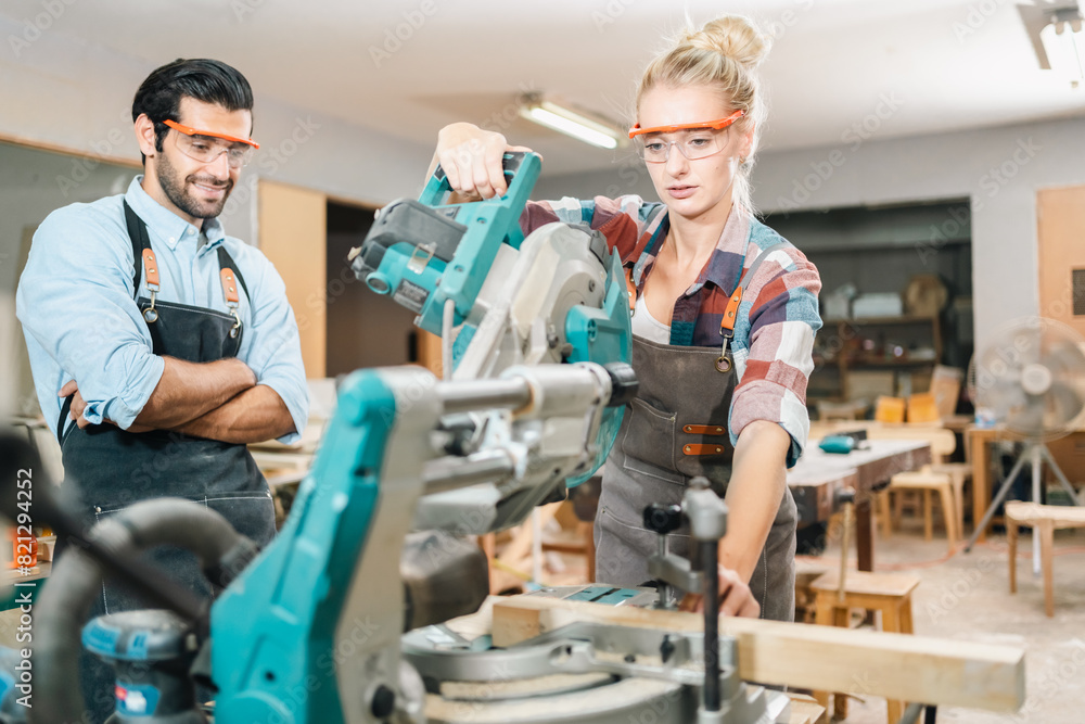 Fototapeta premium professional artisan carpenters woodworking team work together creatively, creative carpenter woman working workshop for wooden craft with wood tool at industry carpenter's shop, business of wood