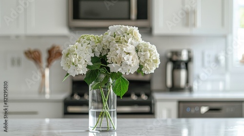 Vase With White Flowers on Counter