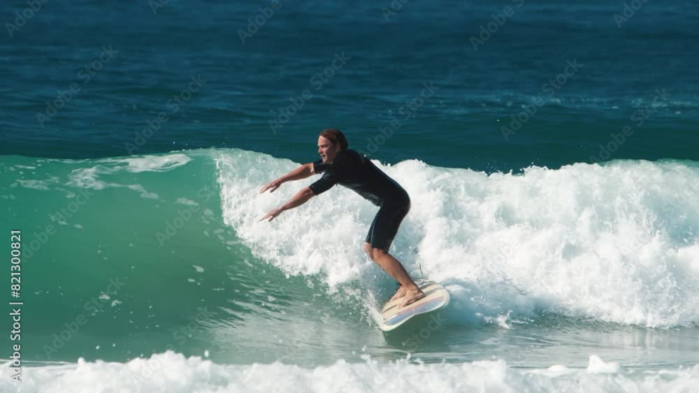 Beginner surfer rides the wave Beginner surfer rides the wave
