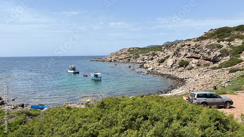 view of the coast of the sea and fishermen boats, Alghero, Porto Ferro photo