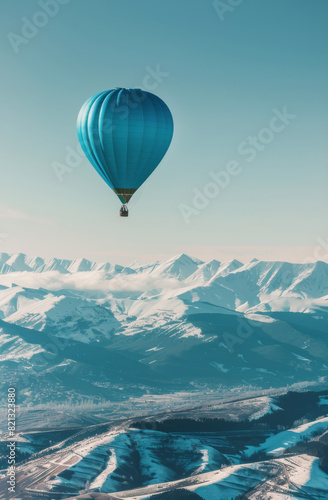 Hot Air Balloon Flying Over Snowy Landscape
