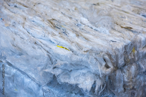 Stacked piles of plastic film watse for recycling. Waste management and ecology