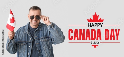 Happy mature man with Canad...