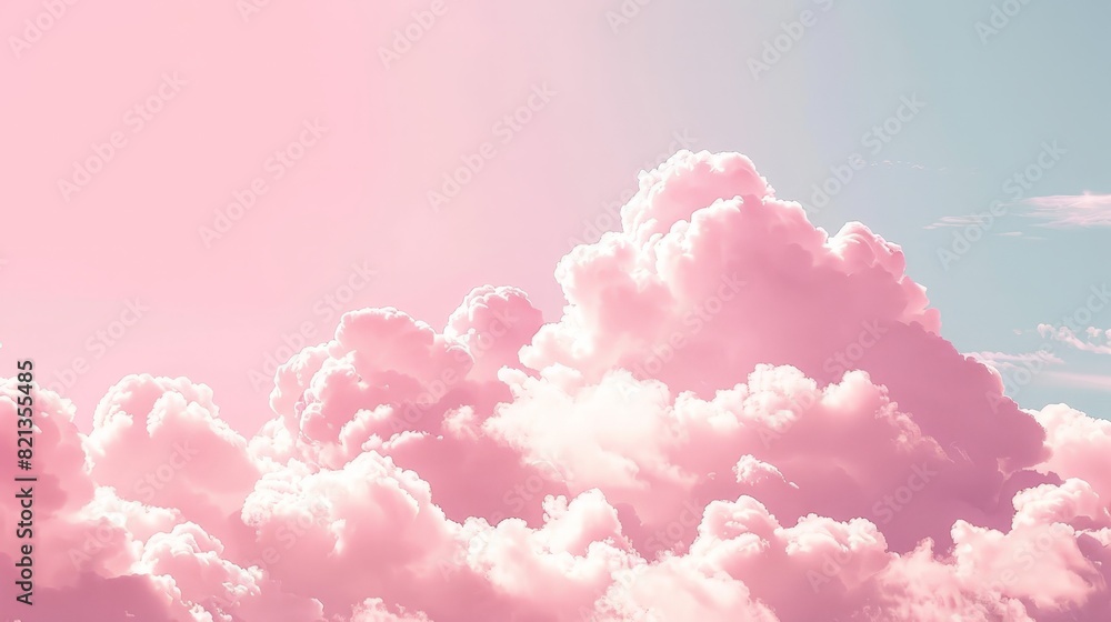 A pink cloud filled sky with a pinkish blue background A pink cloud filled sky with a pinkish blue background