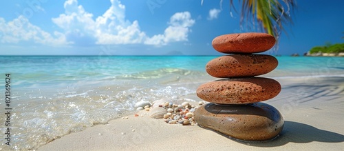 Pile of rocks on sandy beach photo