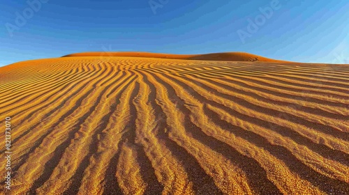 Majestic Sand Dune Under Blue Sky
