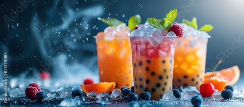 Close up of three refreshing drinks with fruit