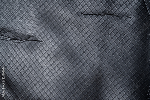 top shot of rubbery dark texture with grid surface photo