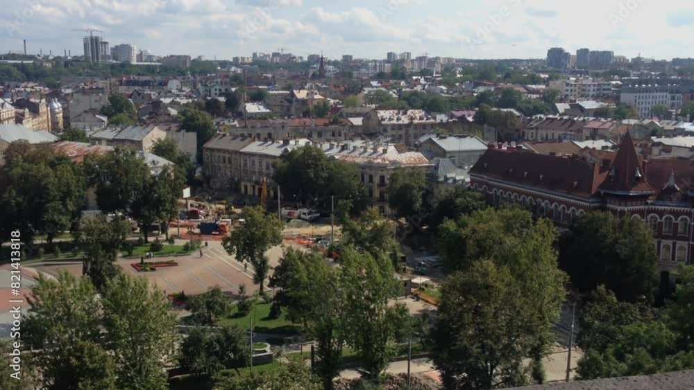 A city view with a park in the middle A city view with a park in the middle