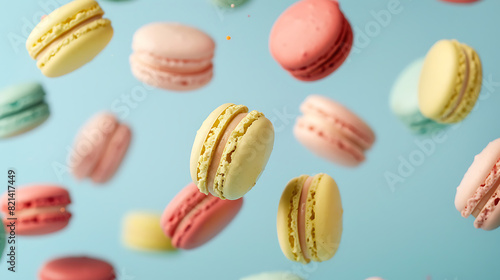 Wallpaper Mural delightful, Colorful macarons floating against a light blue background--what a sweet and whimsical scene Torontodigital.ca
