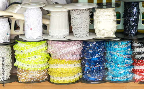 Sparkling decorative ribbons for tailoring fashion industry sold outside on a market