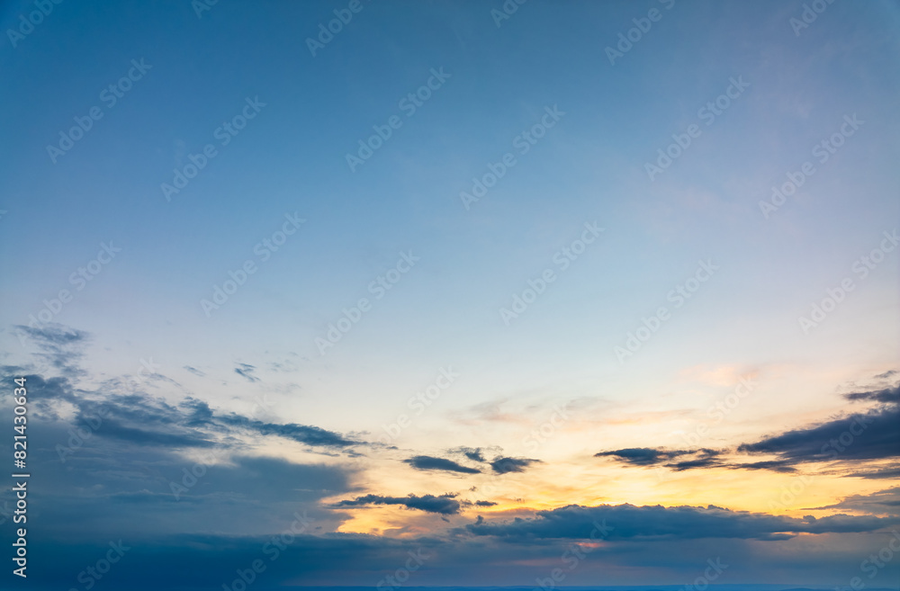 Dramatic cloudy sky background. Orange cloudy sunset sky. Dramatic cloudy sky background. Orange cloudy sunset sky.