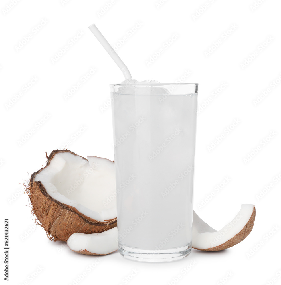 Glass of coconut water, ice cubes and nut isolated on white Glass of coconut water, ice cubes and nut isolated on white