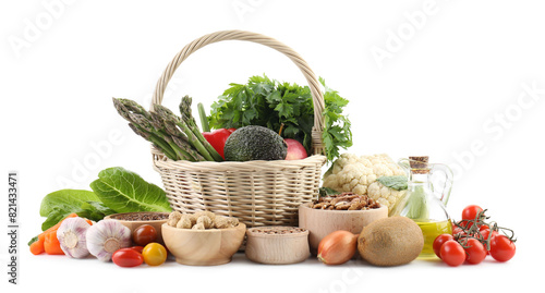 Healthy food. Basket with different fresh products isolated on white