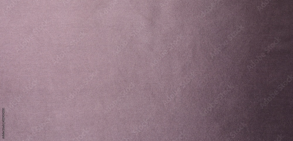 Fototapeta premium Dark purple silk fabric as background, top view